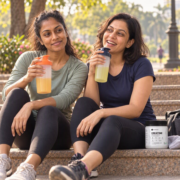 Two women relaxing after a run with EVRYDAY Creatine