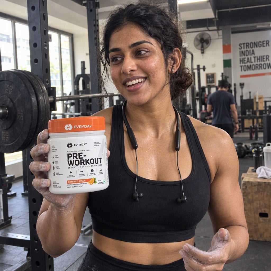 Customer holding EVRYDAY Pre-Workout - Orange